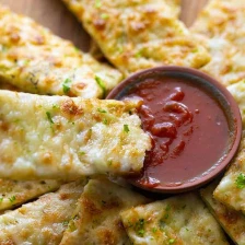 Cheesy Zucchini Breadsticks Recipe Page