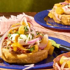 Breakfast Sopes With Refried Beans, Queso Fundido, Poached Eggs, and Salsa Recipe Page