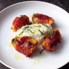 Grilled Prosciutto-Wrapped Peaches With Burrata And Basil Recipe Page