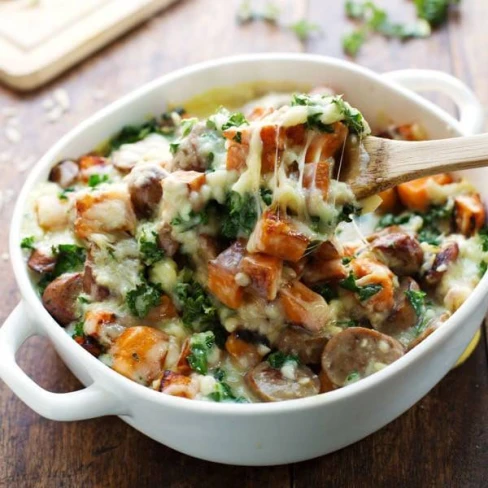 Sweet Potato, Kale, And Sausage Bake With White Cheese Sauce Image