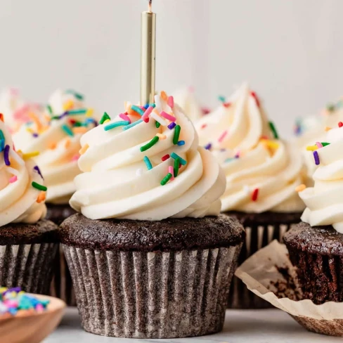 Chocolate Cupcakes With Vanilla Buttercream Frosting Image