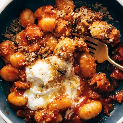 Millionaire Gnocchi with Red Sauce, Herbed Ricotta, and Golden Crispies Image