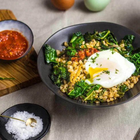 Stir-Fried Farro With Garlicky Kale and Poached Egg Recipe Image