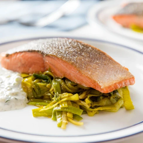 One-Skillet Salmon With Curried Leeks and Yogurt-Herb Sauce Recipe Image