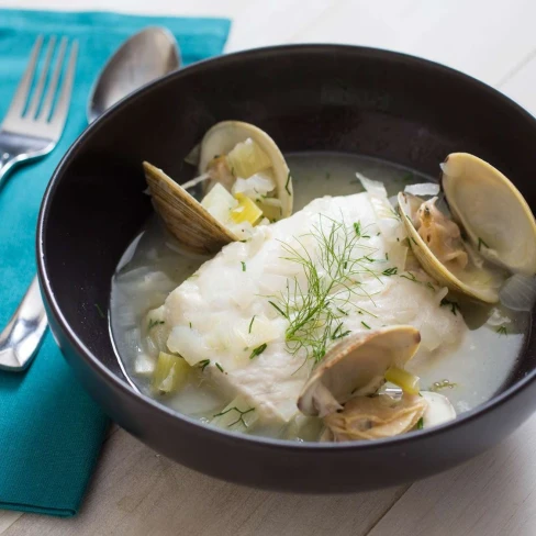 Halibut à la Nage (Poached in Broth) With Clams, Dill, and White Wine Recipe Image