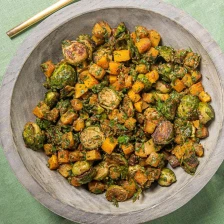 Roast Butternut Squash and Brussels Sprouts With Spiced Honey-Herb Dressing Recipe Page