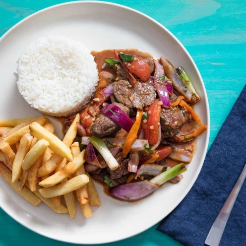 Lomo Saltado (Peruvian Stir-Fried Beef With Onion, Tomatoes, and French Fries) Recipe Image