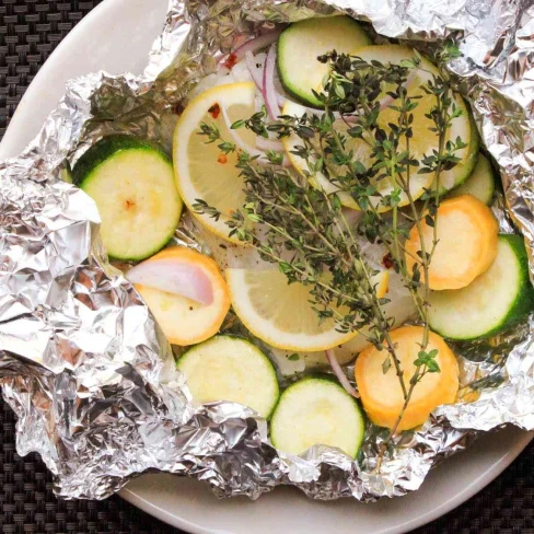 Baked Cod and Summer Squash in Foil Packets Recipe Image