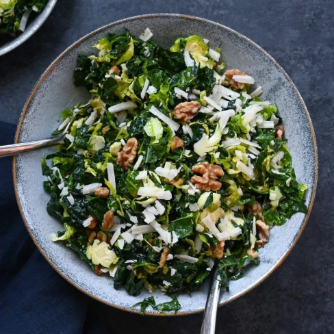 Kale &amp; Brussels Sprout Salad with Walnuts, Parmesan &amp; Lemon-Mustard Dressing Image