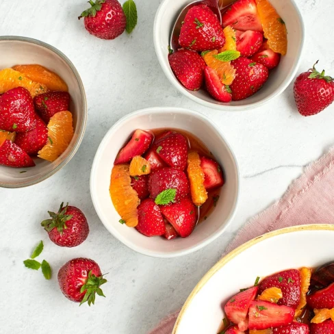 Strawberry and Orange Salad with Citrus Syrup and Fresh Mint Image