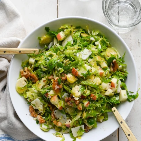 Brussels Sprout Salad with Apples, Walnuts &amp; Parmesan Image